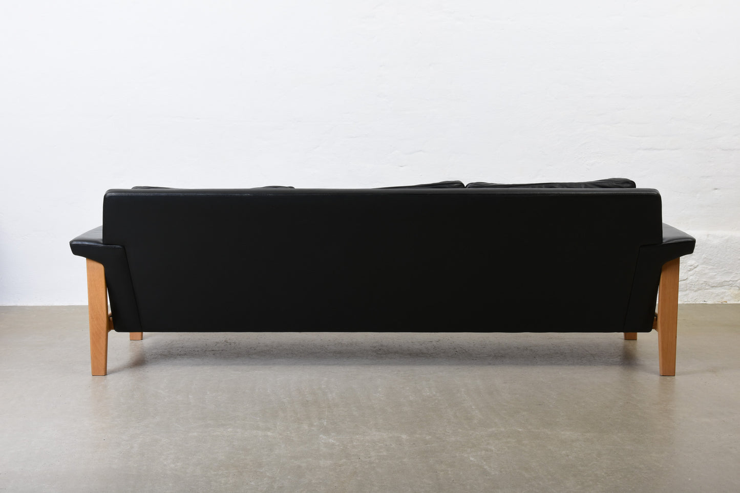1960s leather + oak three seater by Ulferts