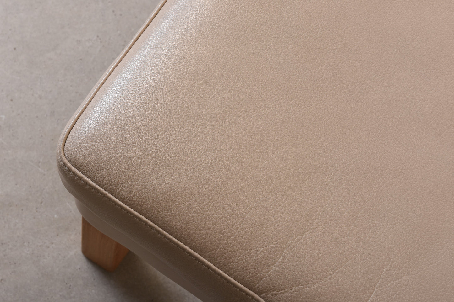 1980s leather foot stool on oak legs