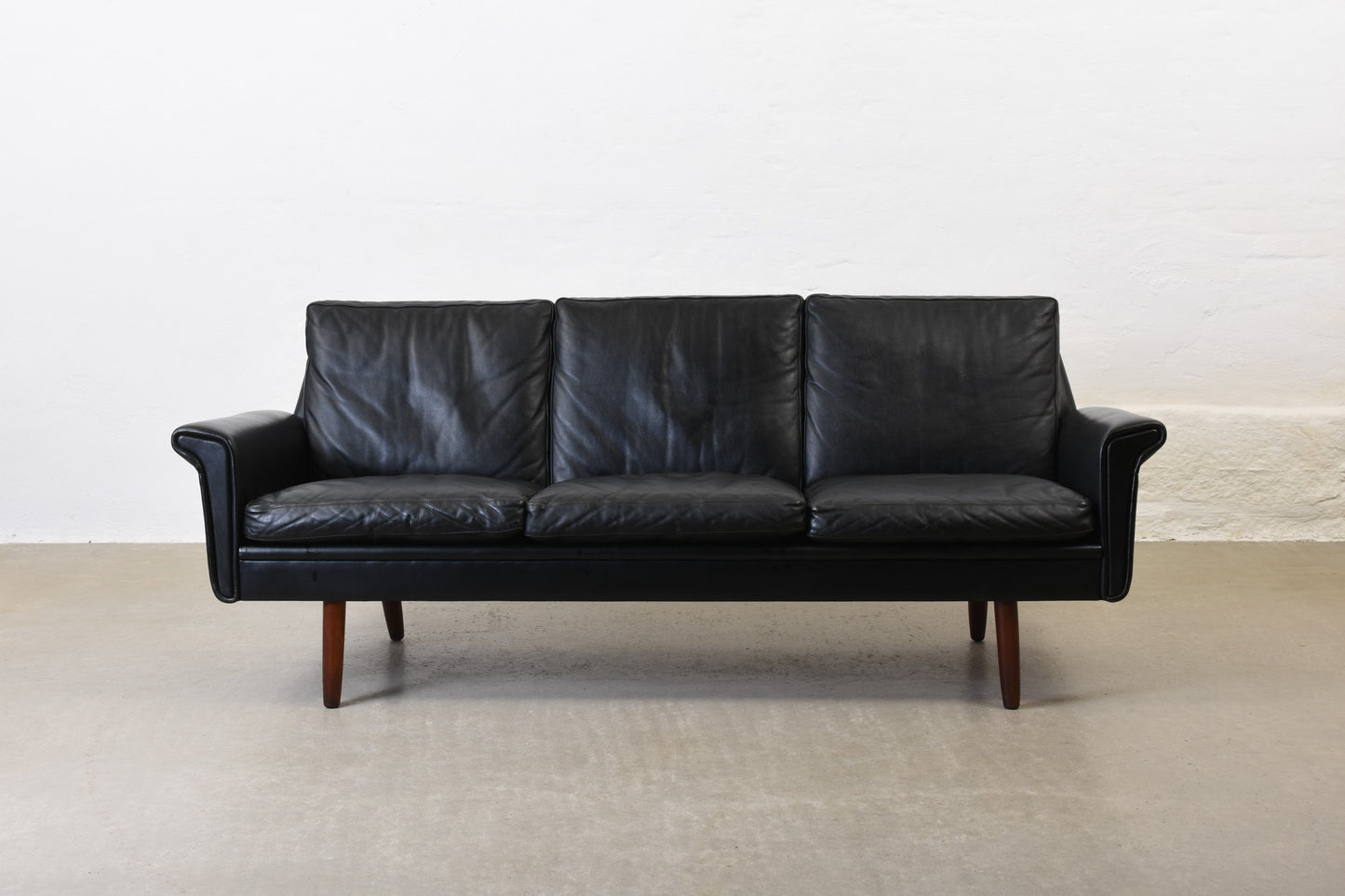 1960s three seater in black leather
