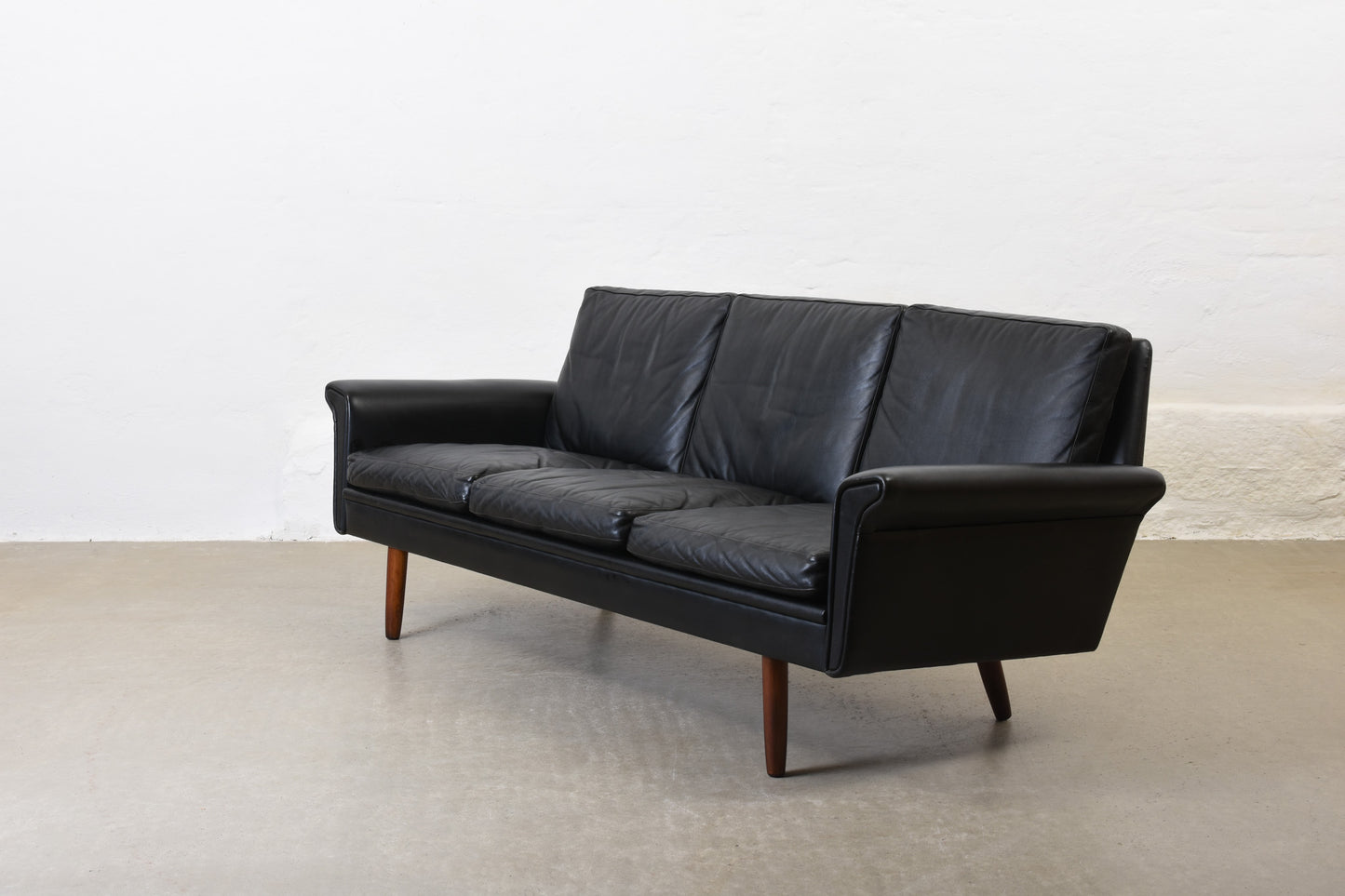 1960s three seater in black leather