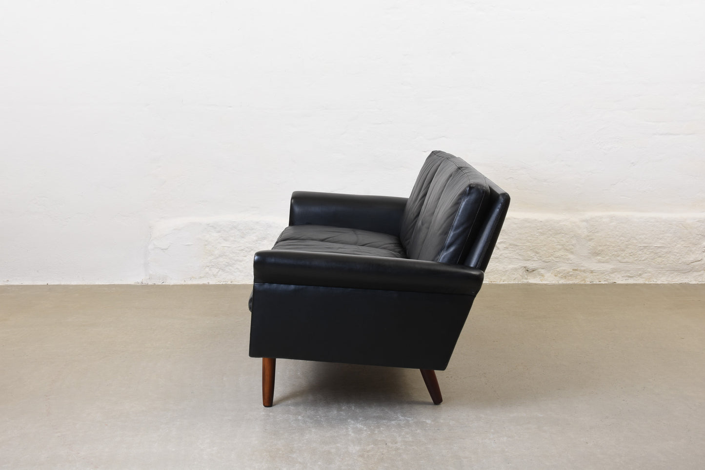 1960s three seater in black leather