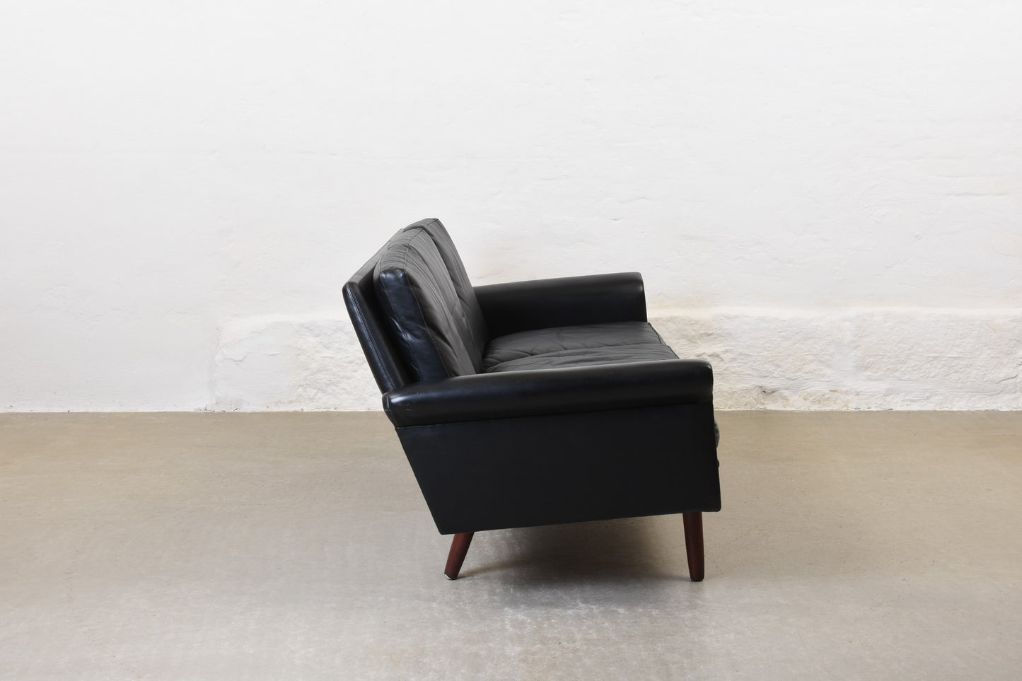 1960s three seater in black leather