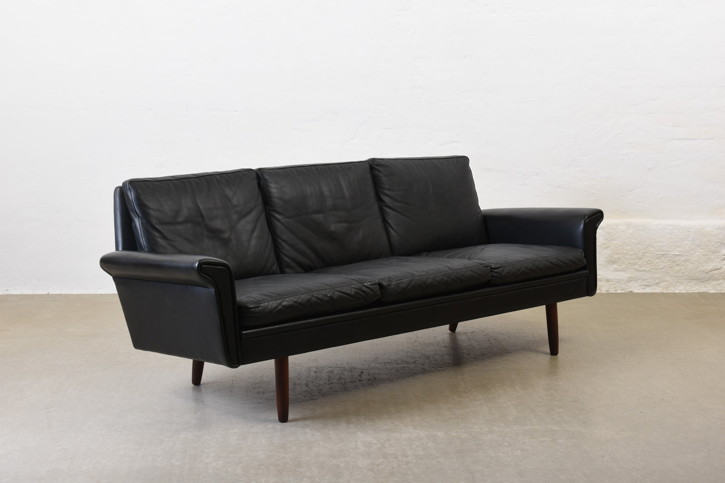 1960s three seater in black leather