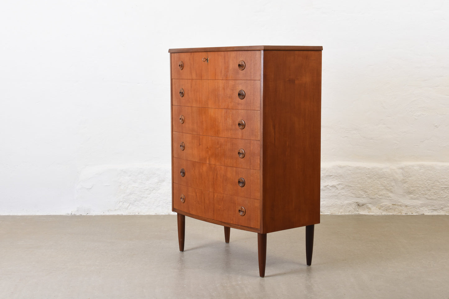 1960s bow-fronted chest in teak