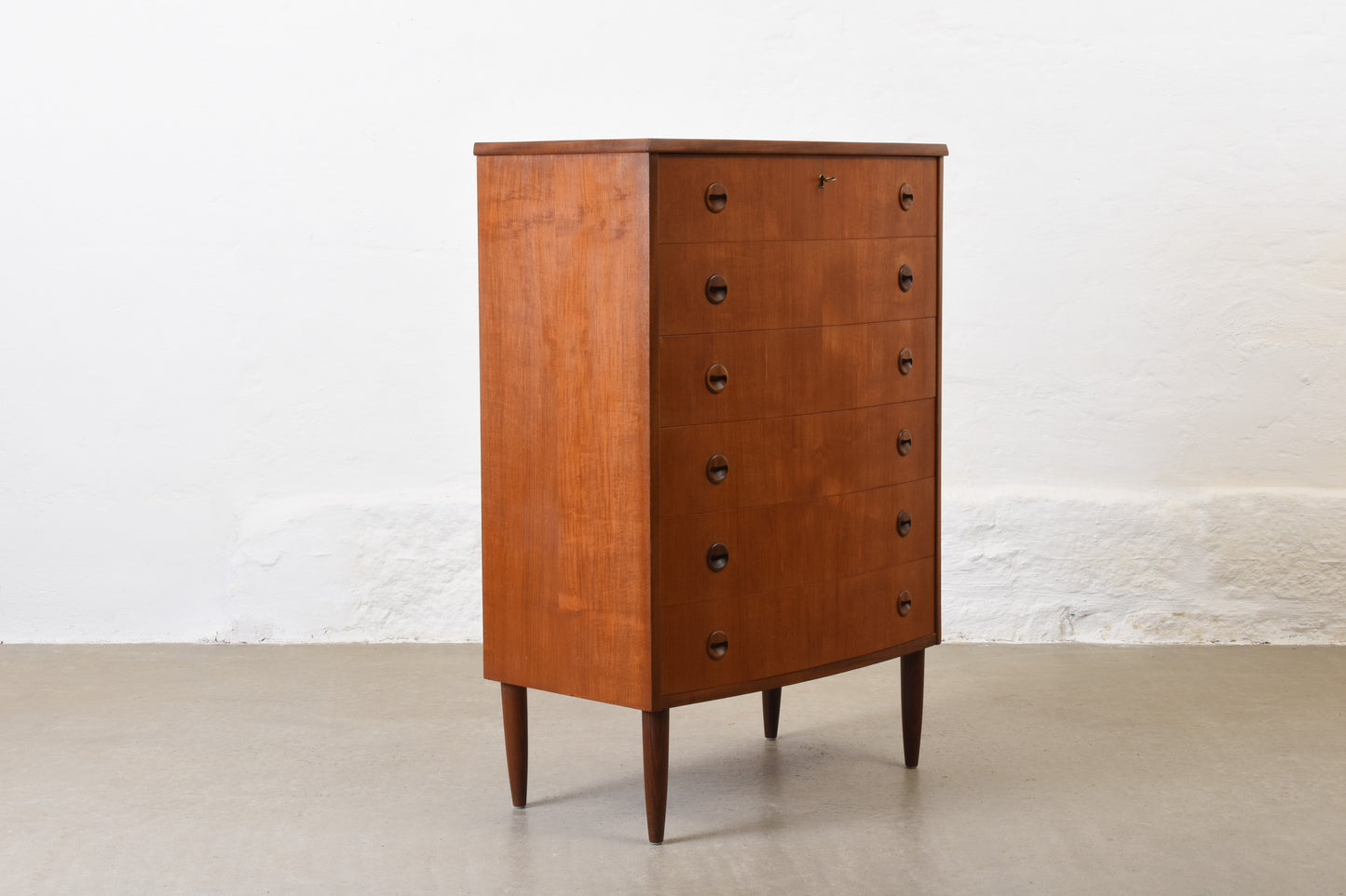 1960s bow-fronted chest in teak