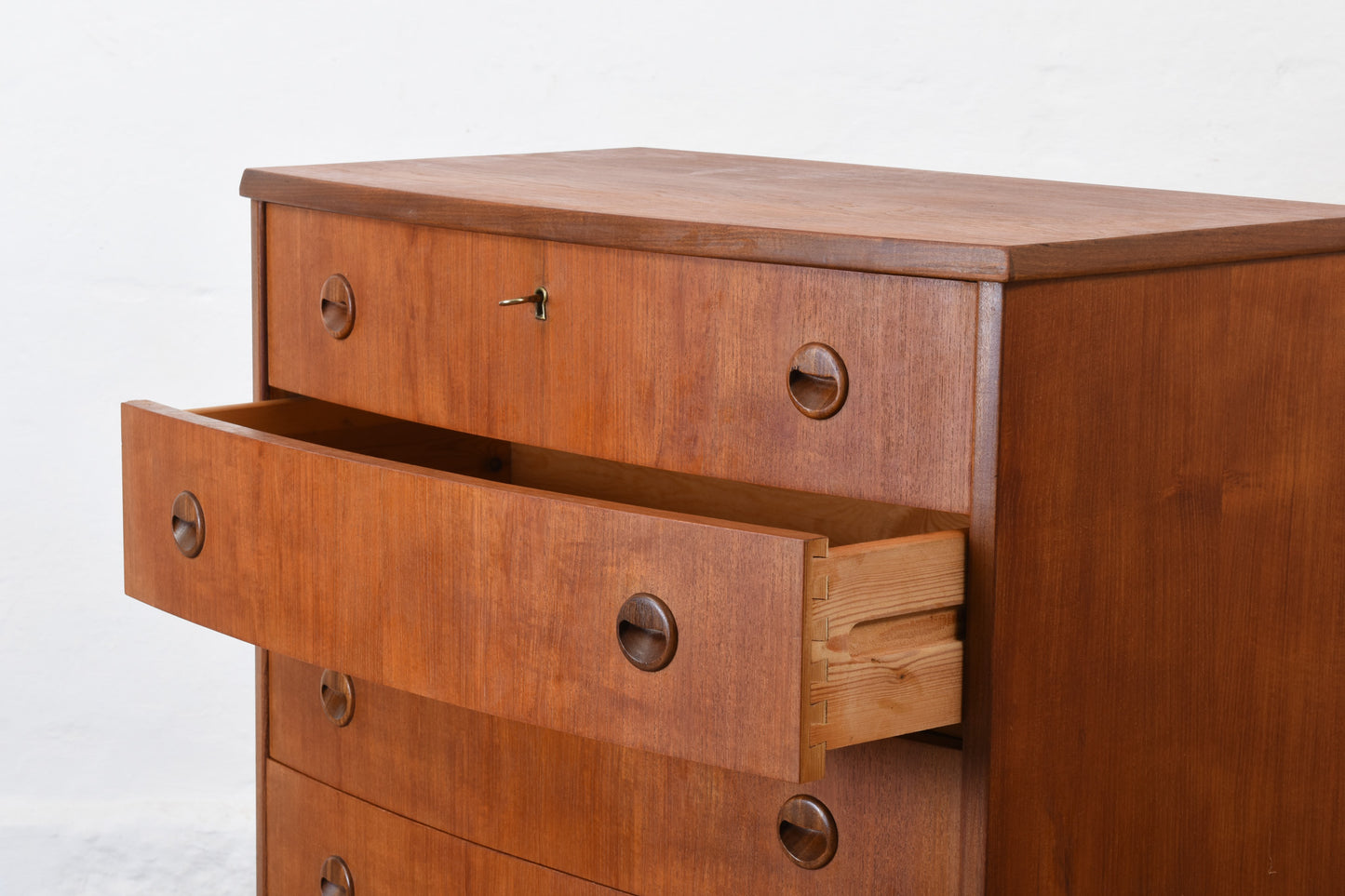 1960s bow-fronted chest in teak
