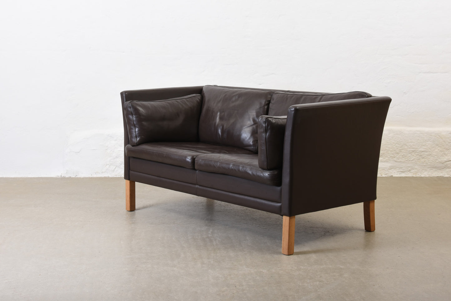 Save £150: 1990s leather two seater by Mogens Hansen