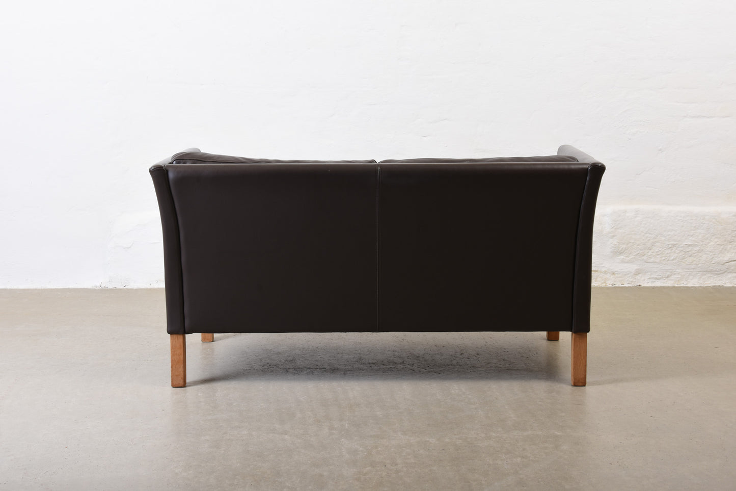 Save £150: 1990s leather two seater by Mogens Hansen