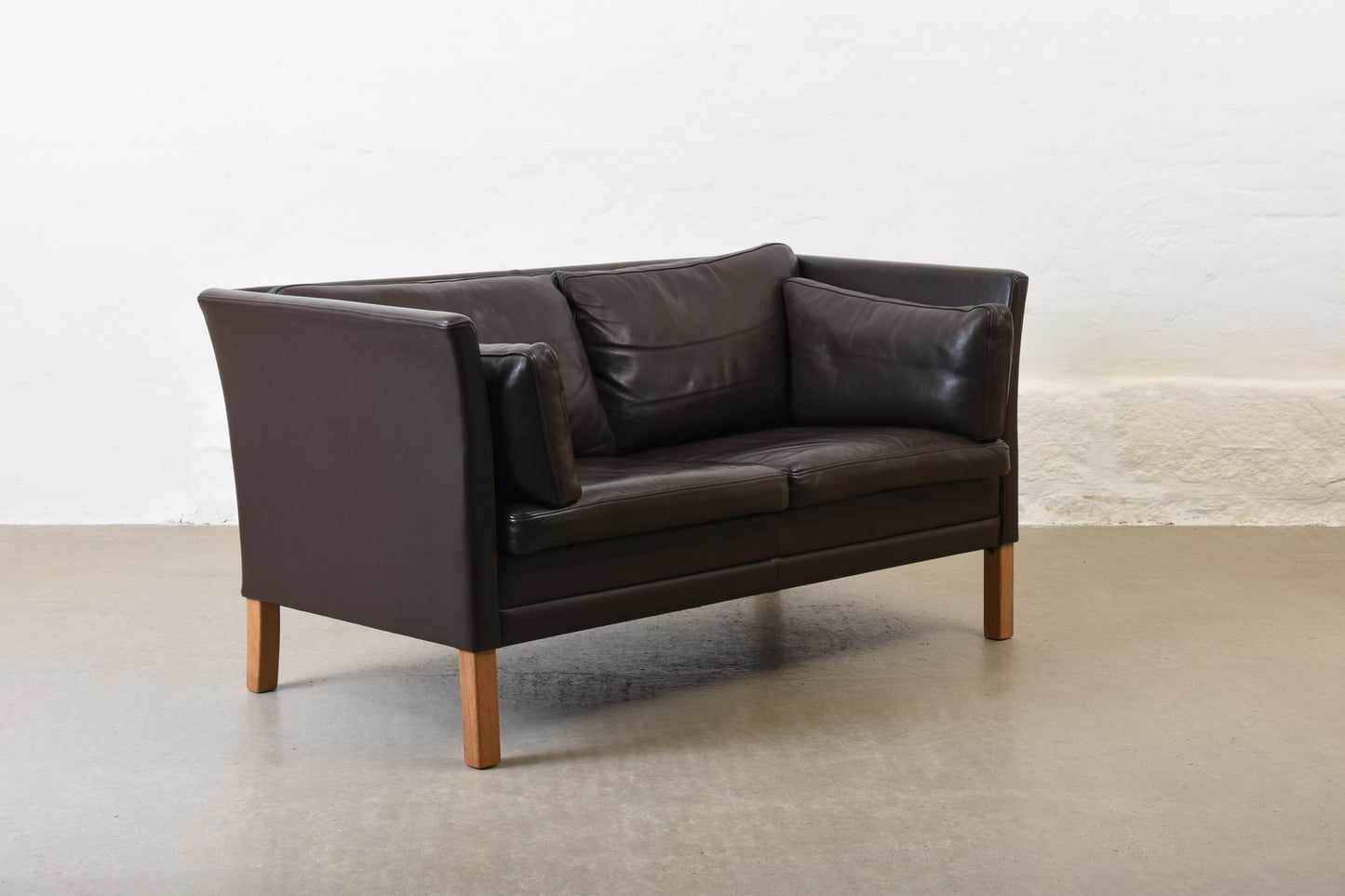 Save £150: 1990s leather two seater by Mogens Hansen