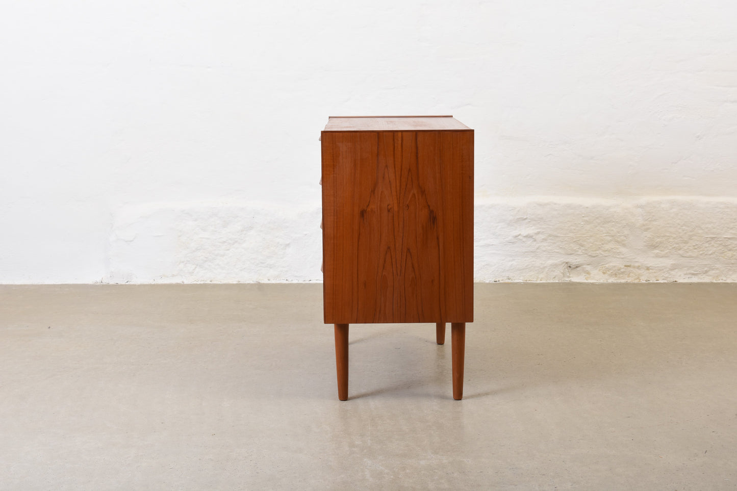 1960s low chest of four drawers in teak no. 1