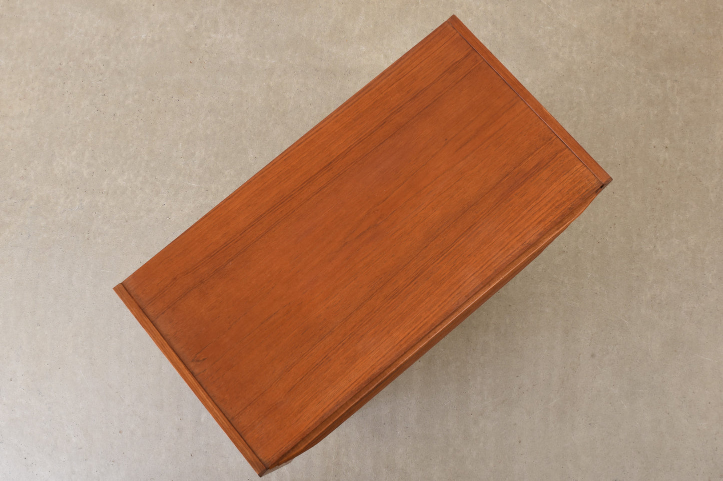 1960s low chest of four drawers in teak no. 1