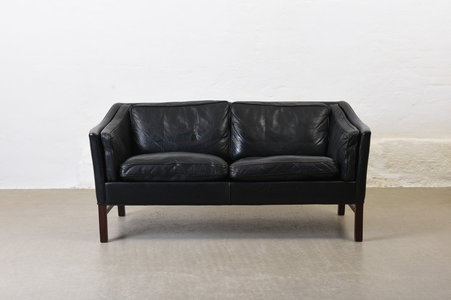 Save £150: 1970s leather two seater by Grandt Design
