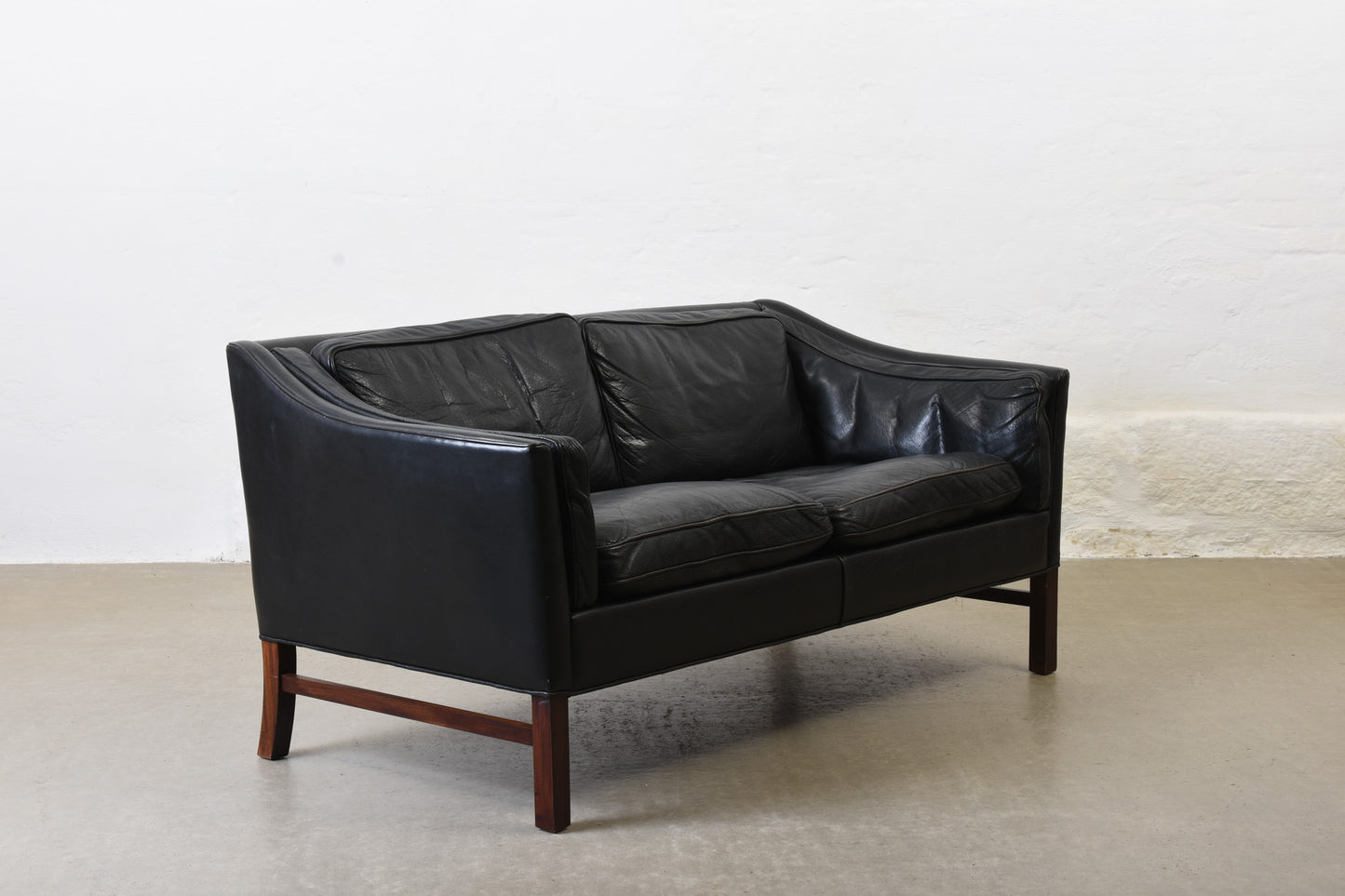 Save £150: 1970s leather two seater by Grandt Design