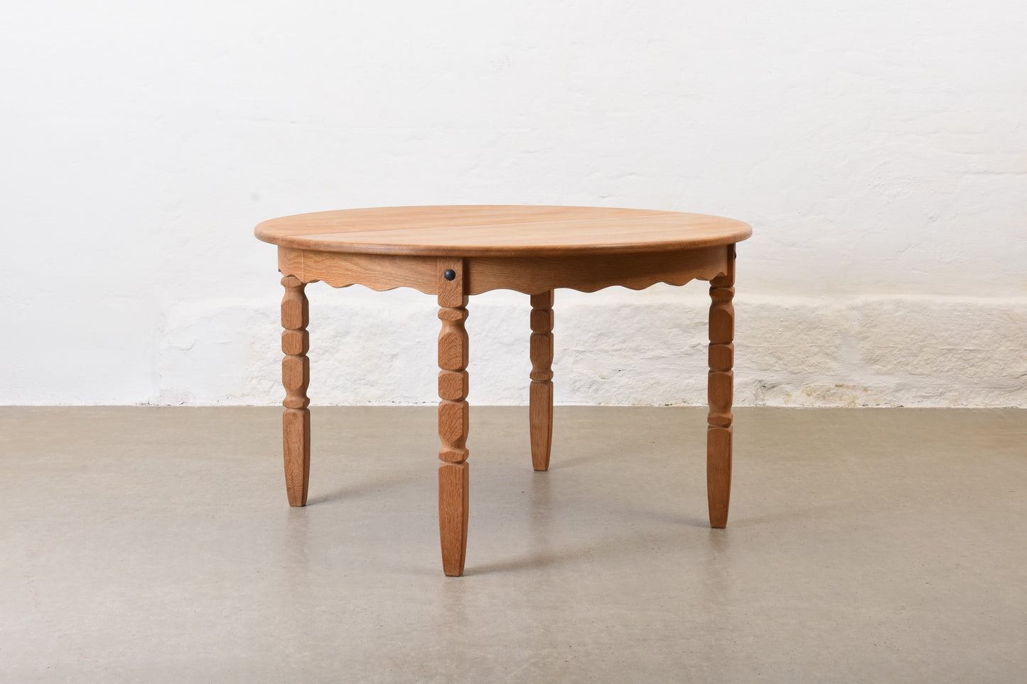 1970s extending oak dining table by Henning Kjærnulf
