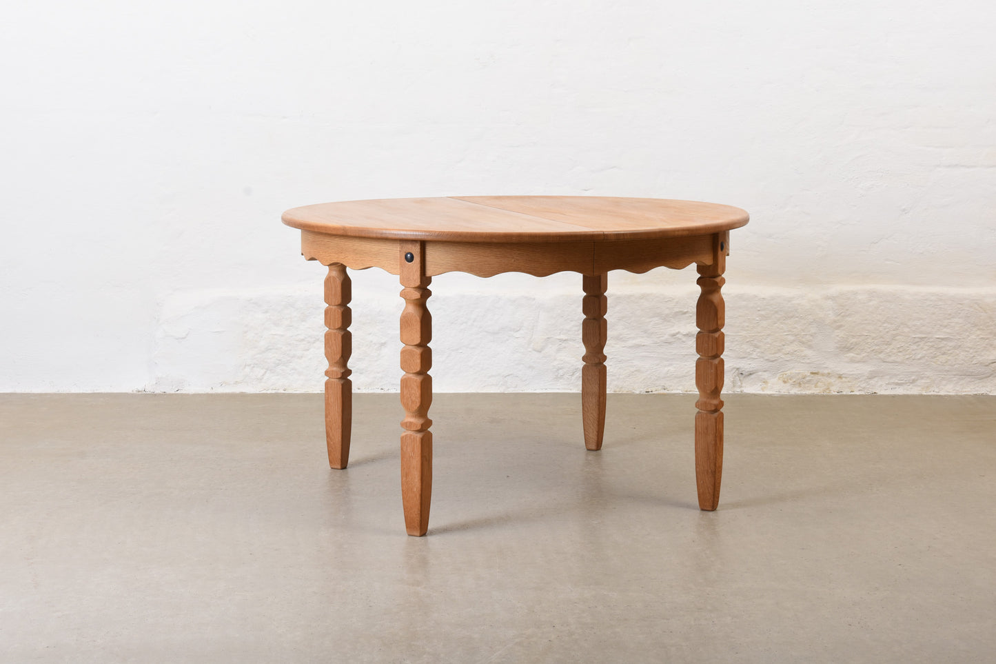 1970s extending oak dining table by Henning Kjærnulf