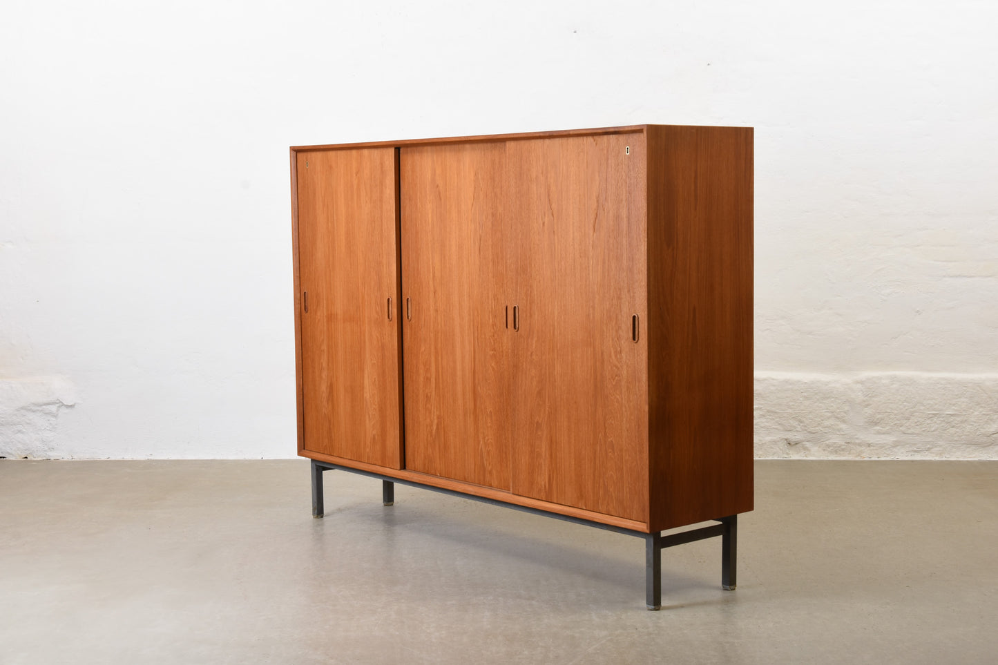 1960s teak archive cabinet on metal base