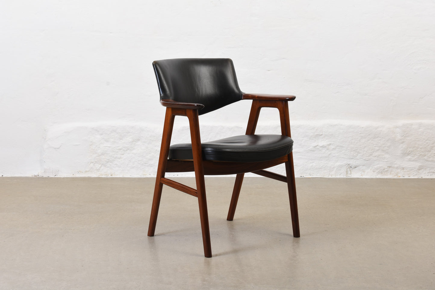 1950s armchair in rosewood + leather by Erik Kirkegaard