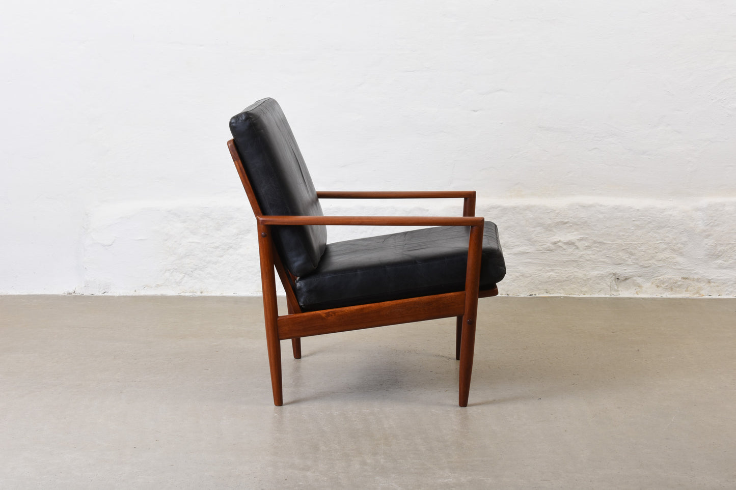 1960s Danish teak + leather lounger
