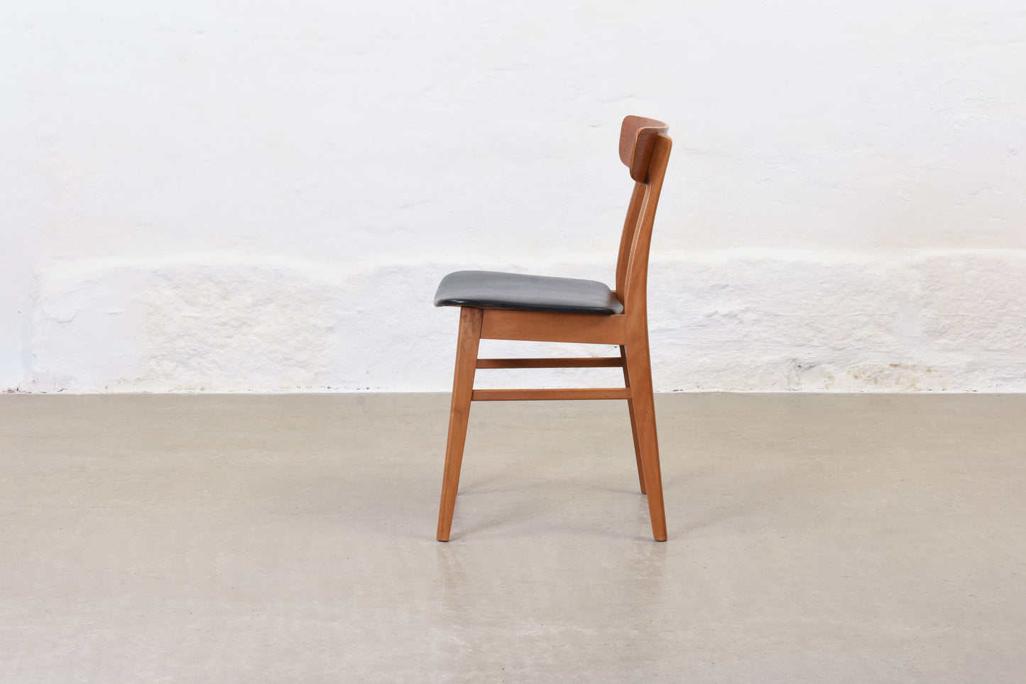 Two available: Teak + beech dining chairs by Findahls