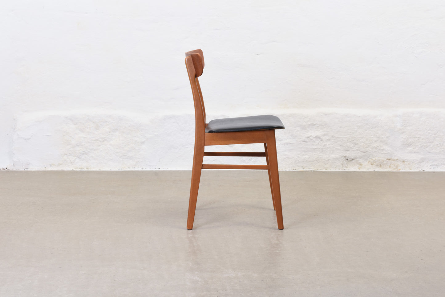 Two available: Teak + beech dining chairs by Findahls