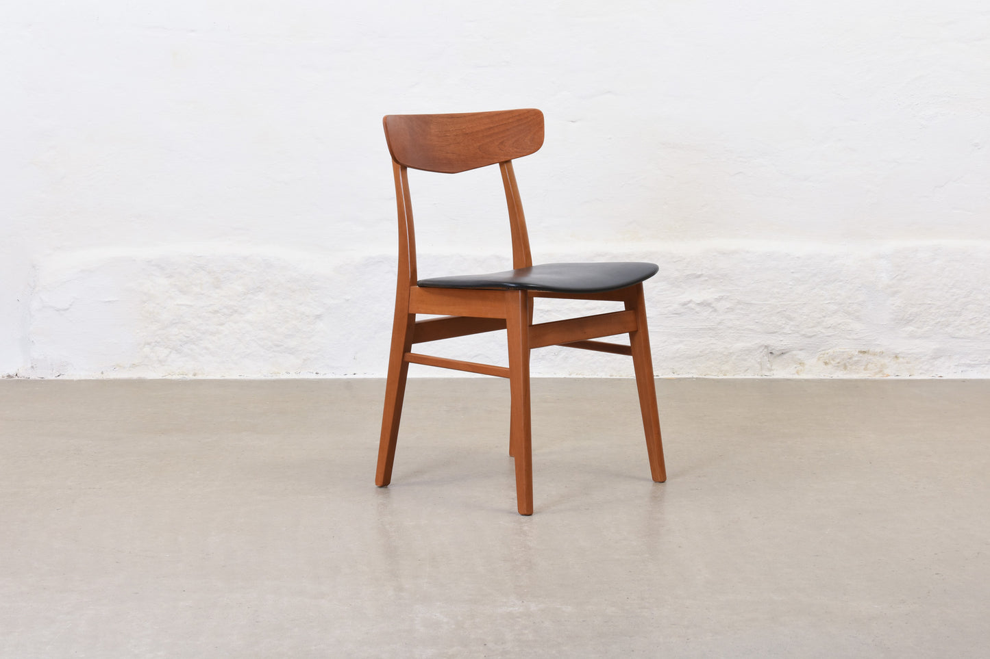 Two available: Teak + beech dining chairs by Findahls