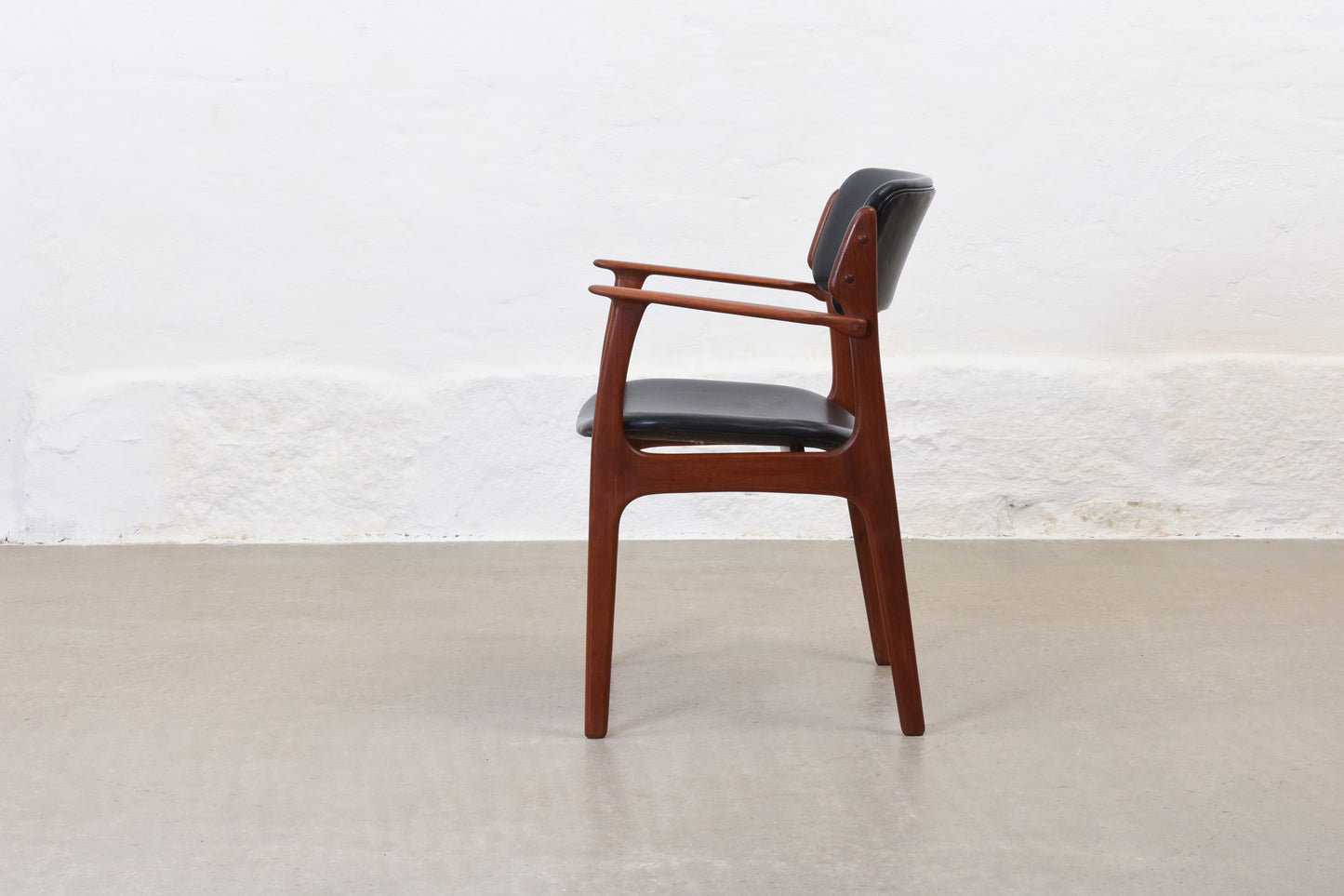 1960s armchair in teak + vinyl by Erik Buch