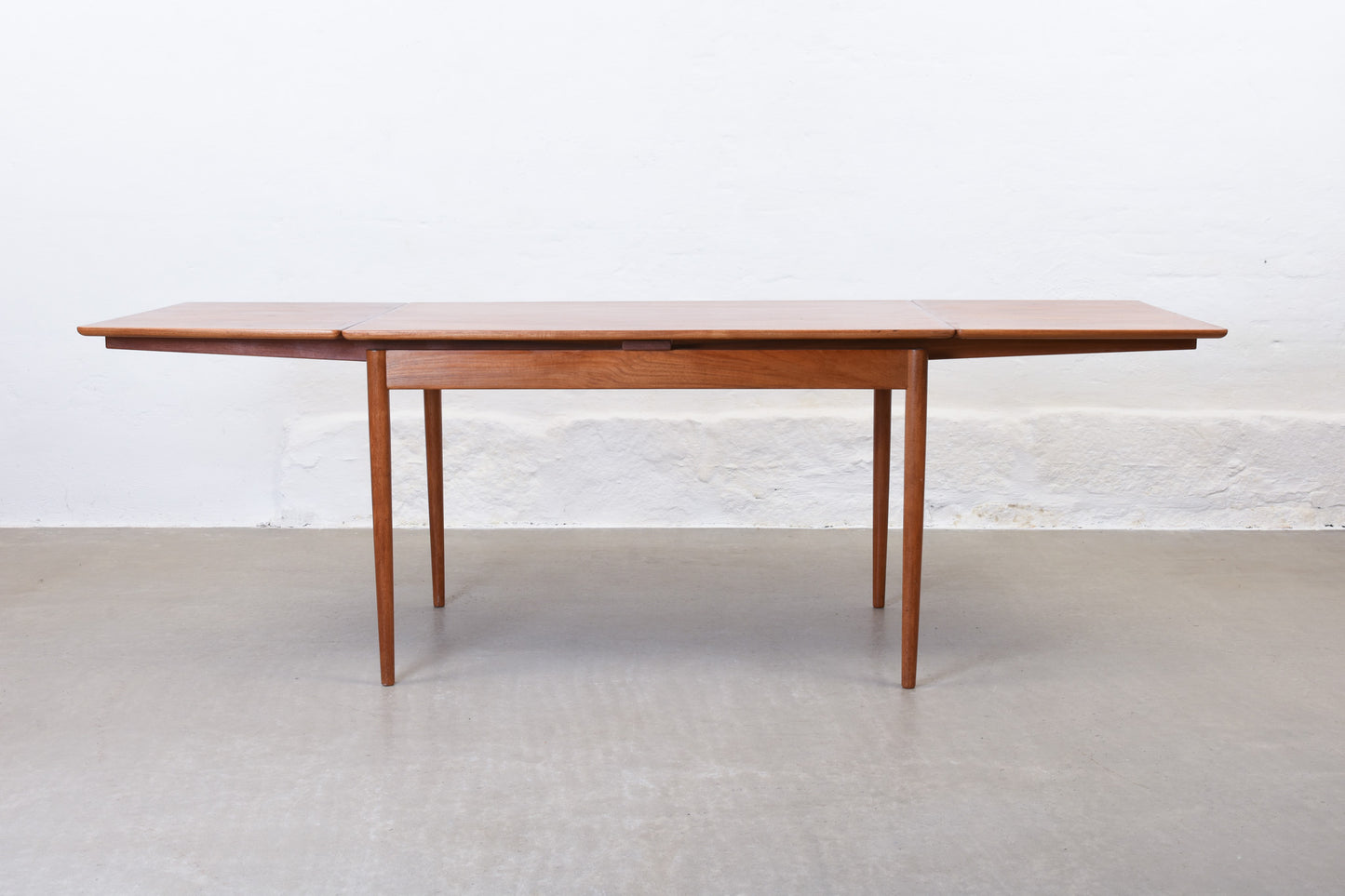 1950s extending teak dining table by Gustav Bertelsen