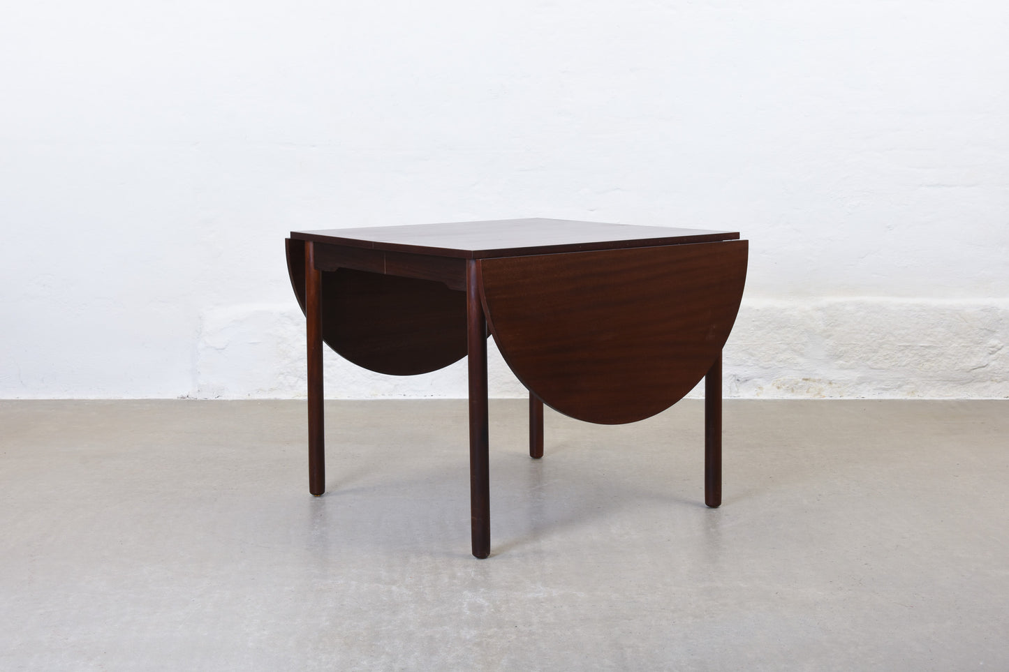 1970s drop-leaf dining table in mahogany