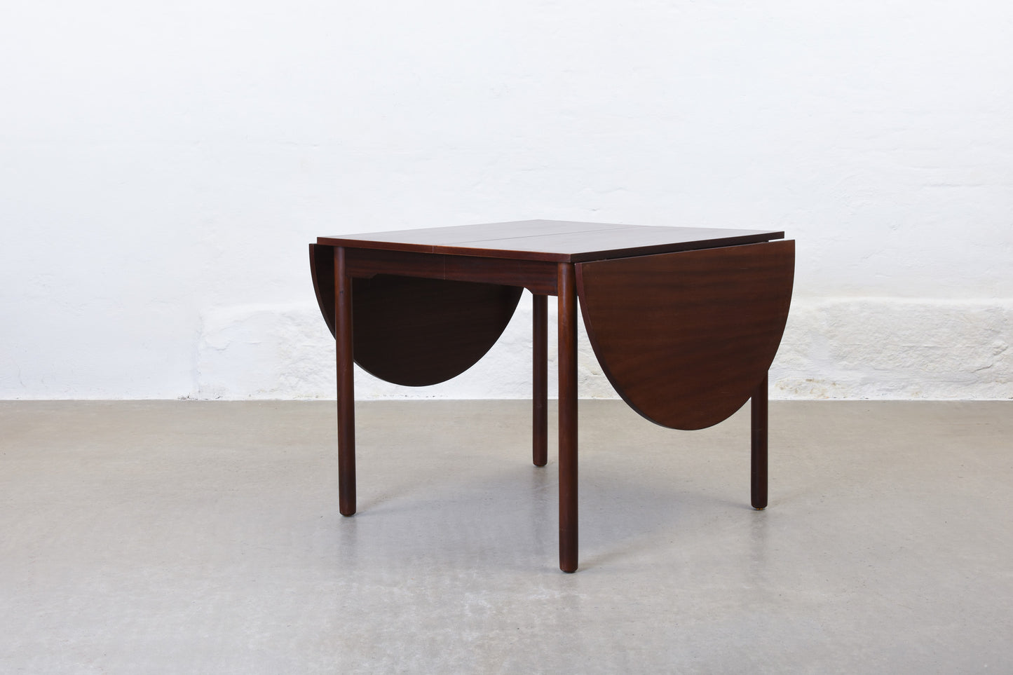 1970s drop-leaf dining table in mahogany