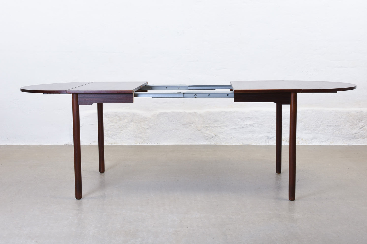 1970s drop-leaf dining table in mahogany