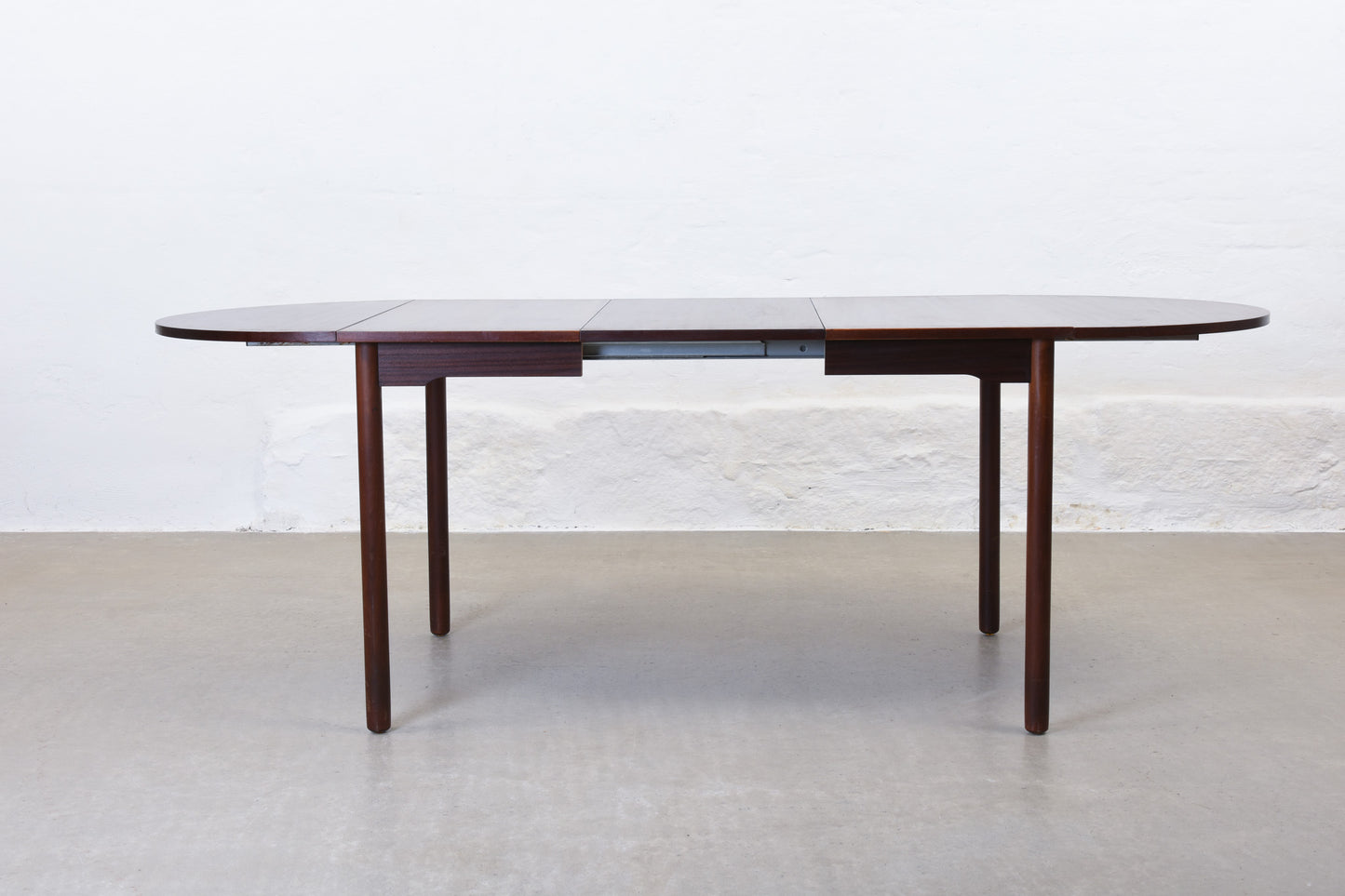 1970s drop-leaf dining table in mahogany