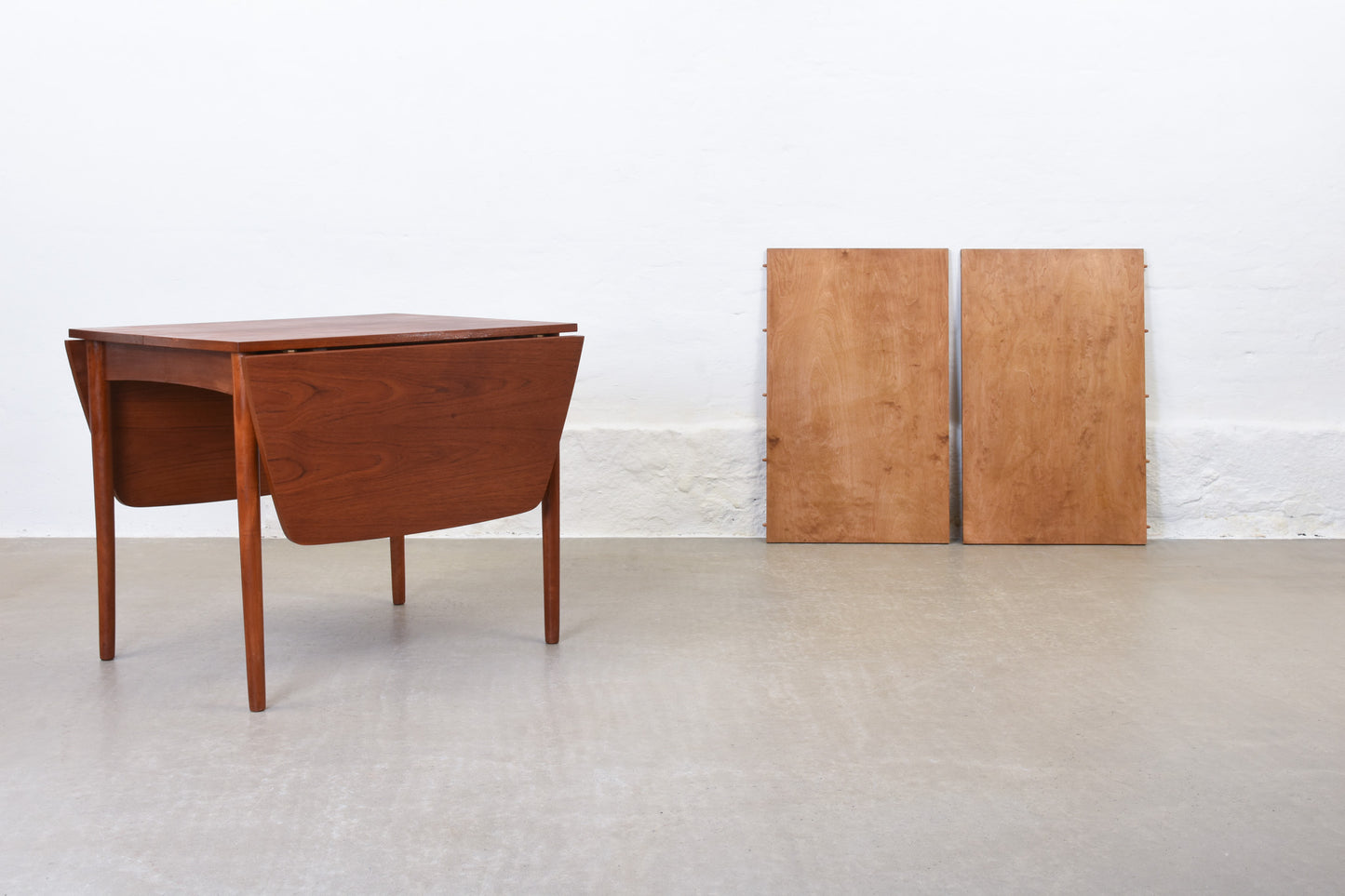 1960s extending dining table in teak with drop leaves