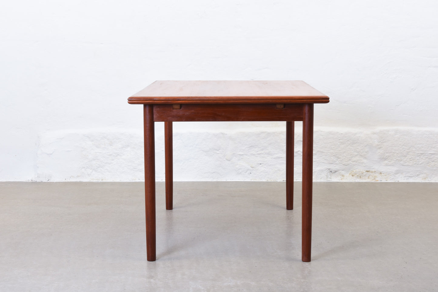 1960s extending dining table in teak by H. Sigh & Søn