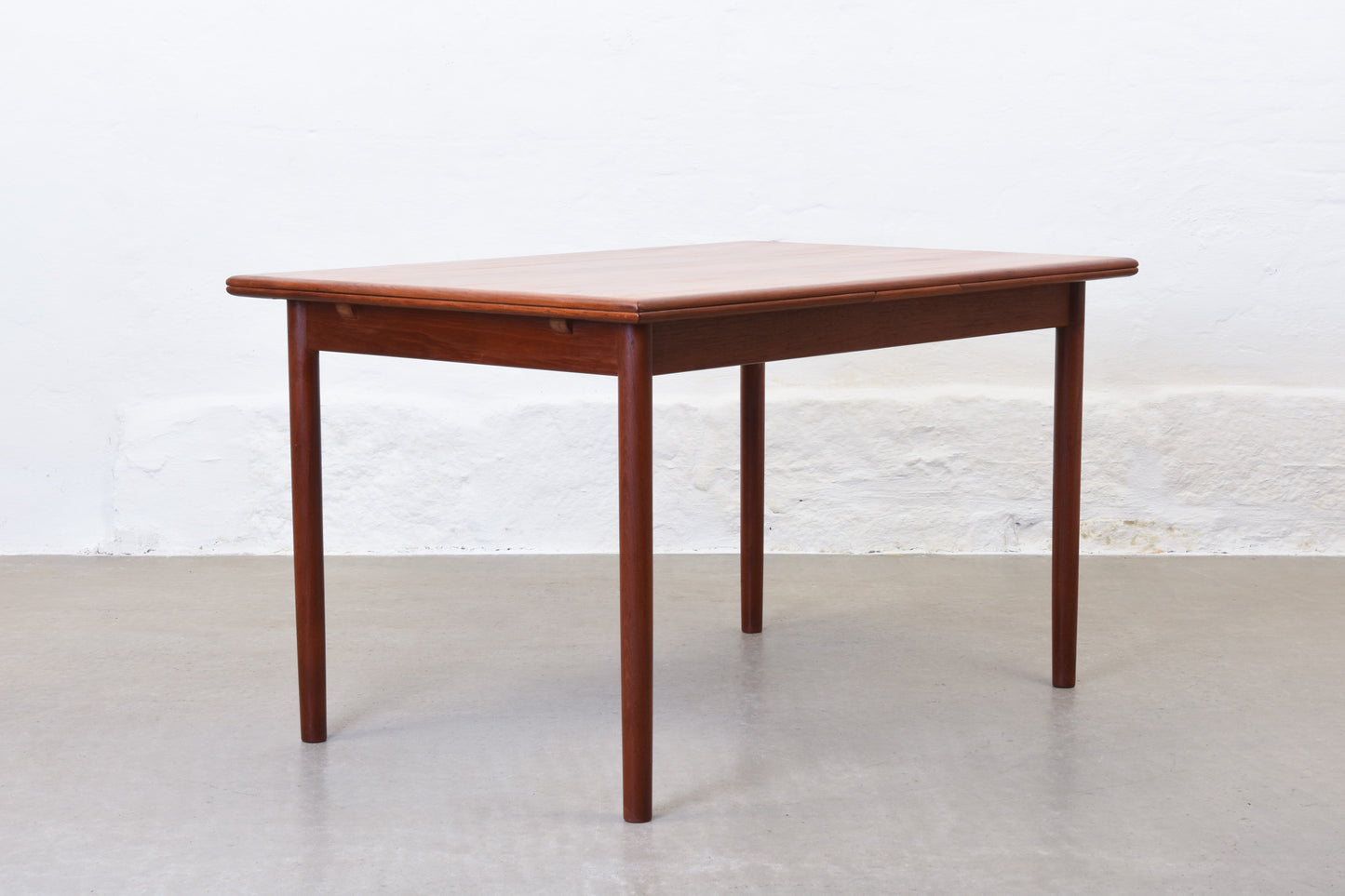 1960s extending dining table in teak by H. Sigh & Søn