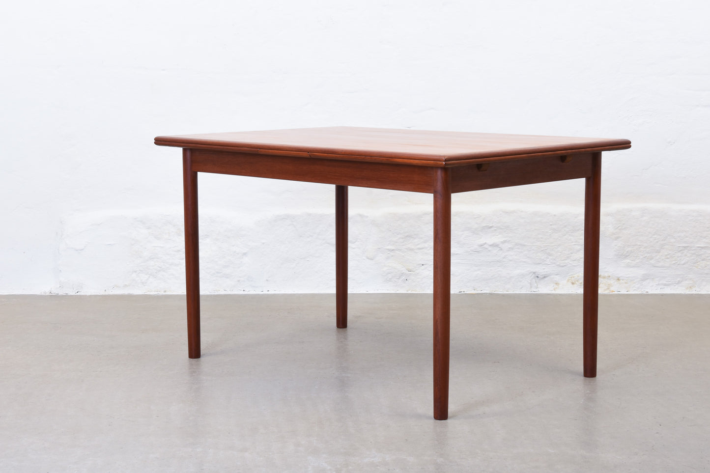 1960s extending dining table in teak by H. Sigh & Søn