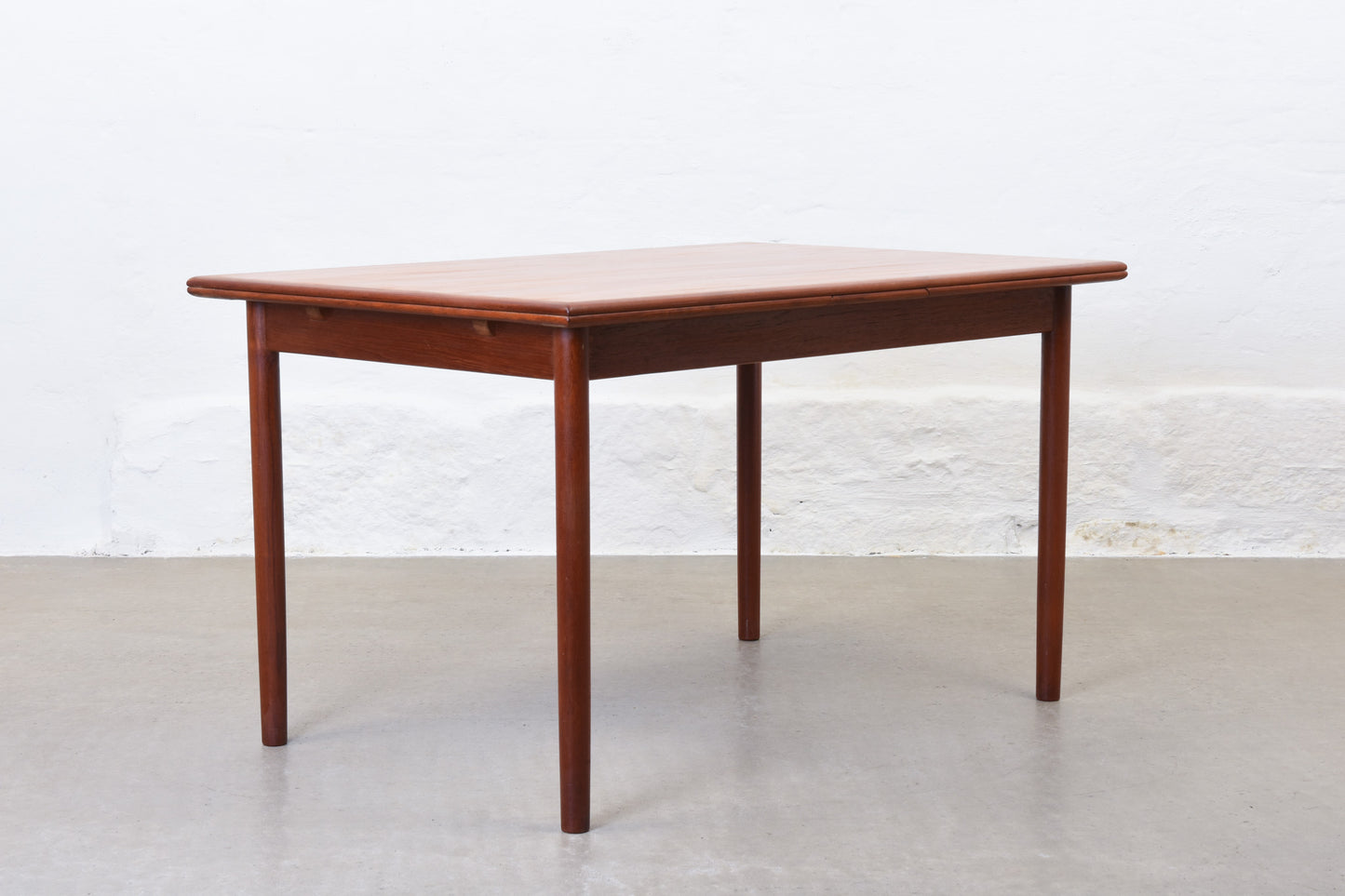 1960s extending dining table in teak by H. Sigh & Søn