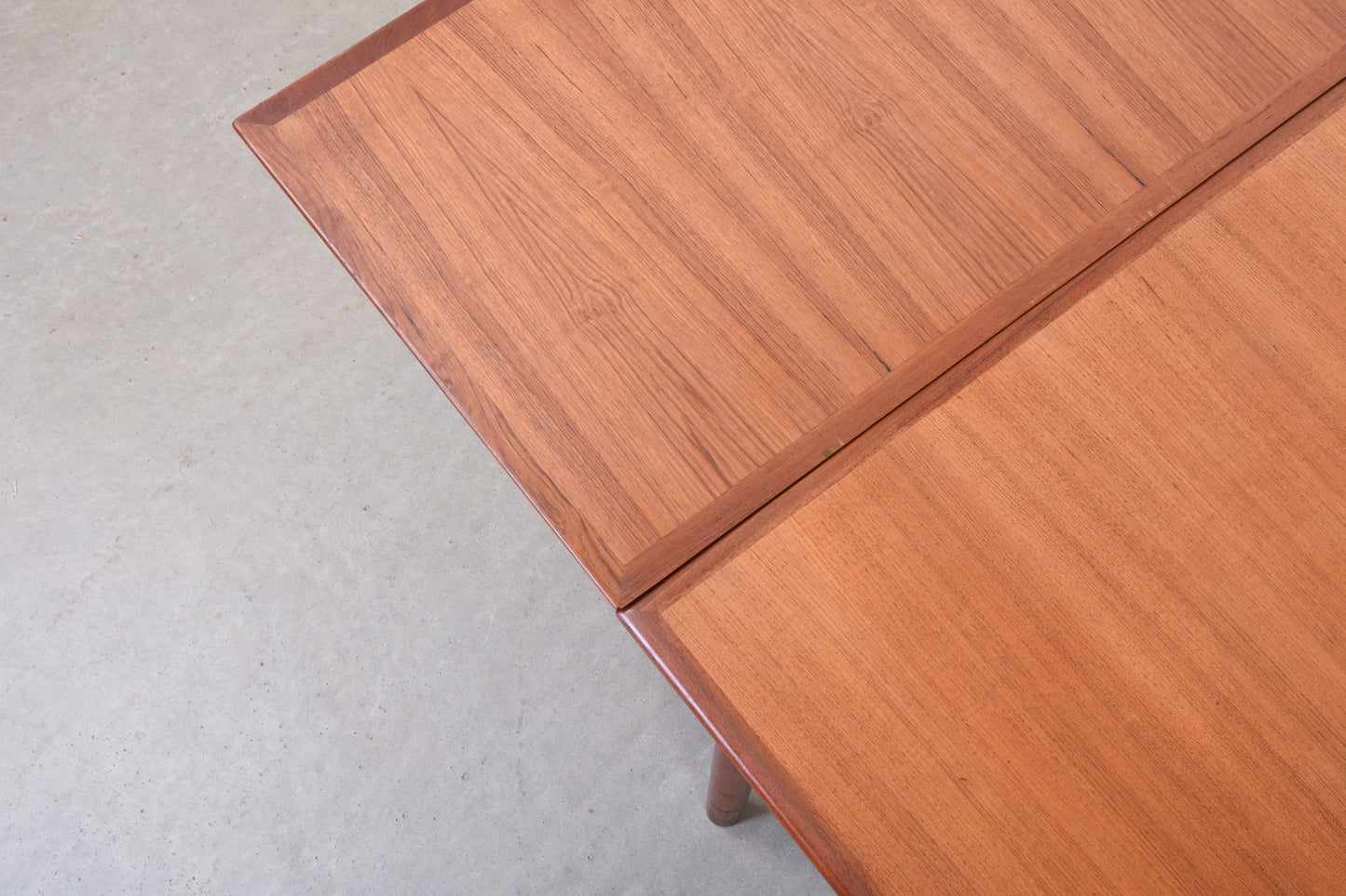 1960s extending dining table in teak by H. Sigh & Søn