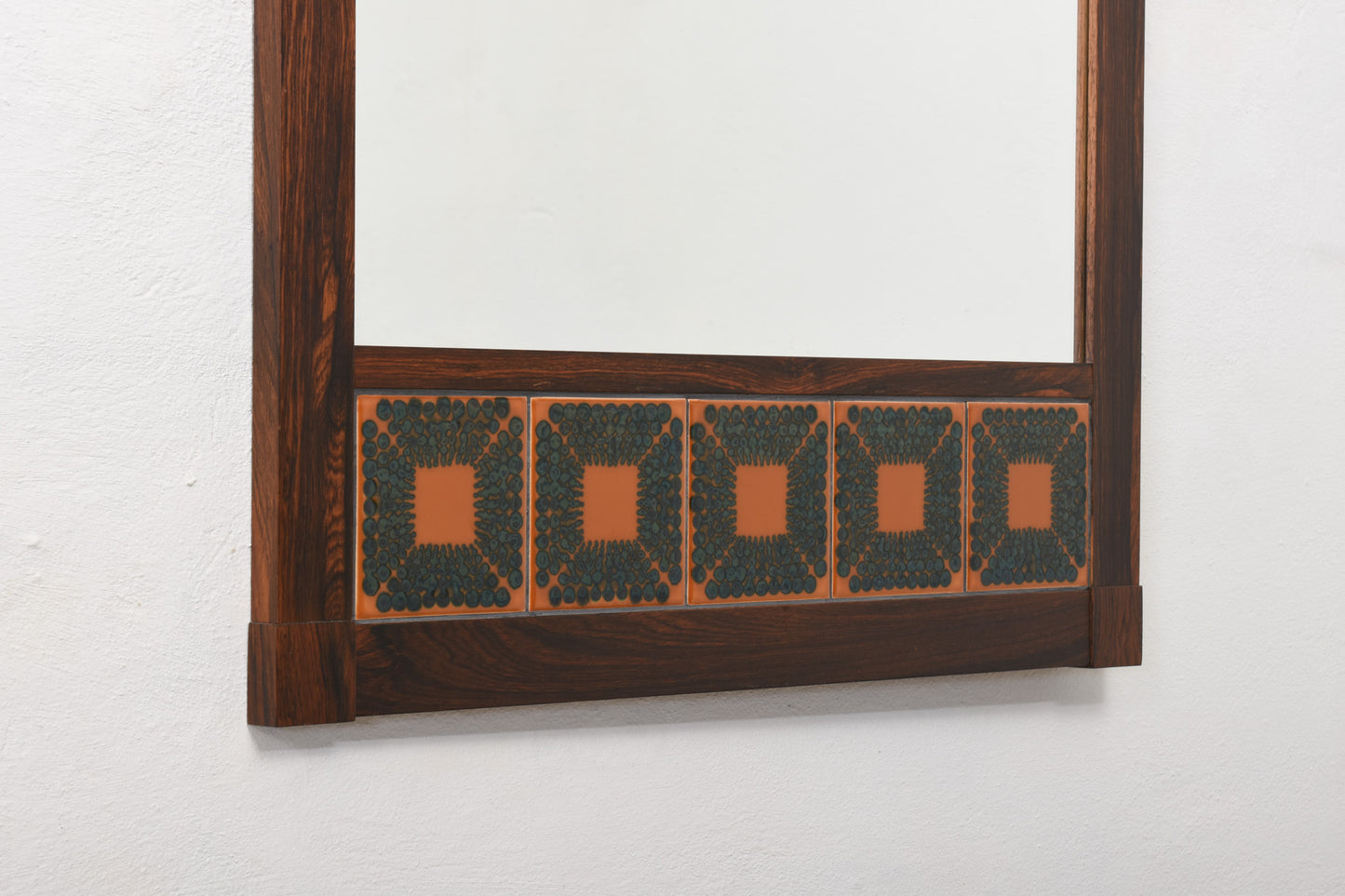 1970s rosewood mirror with ceramic inlay
