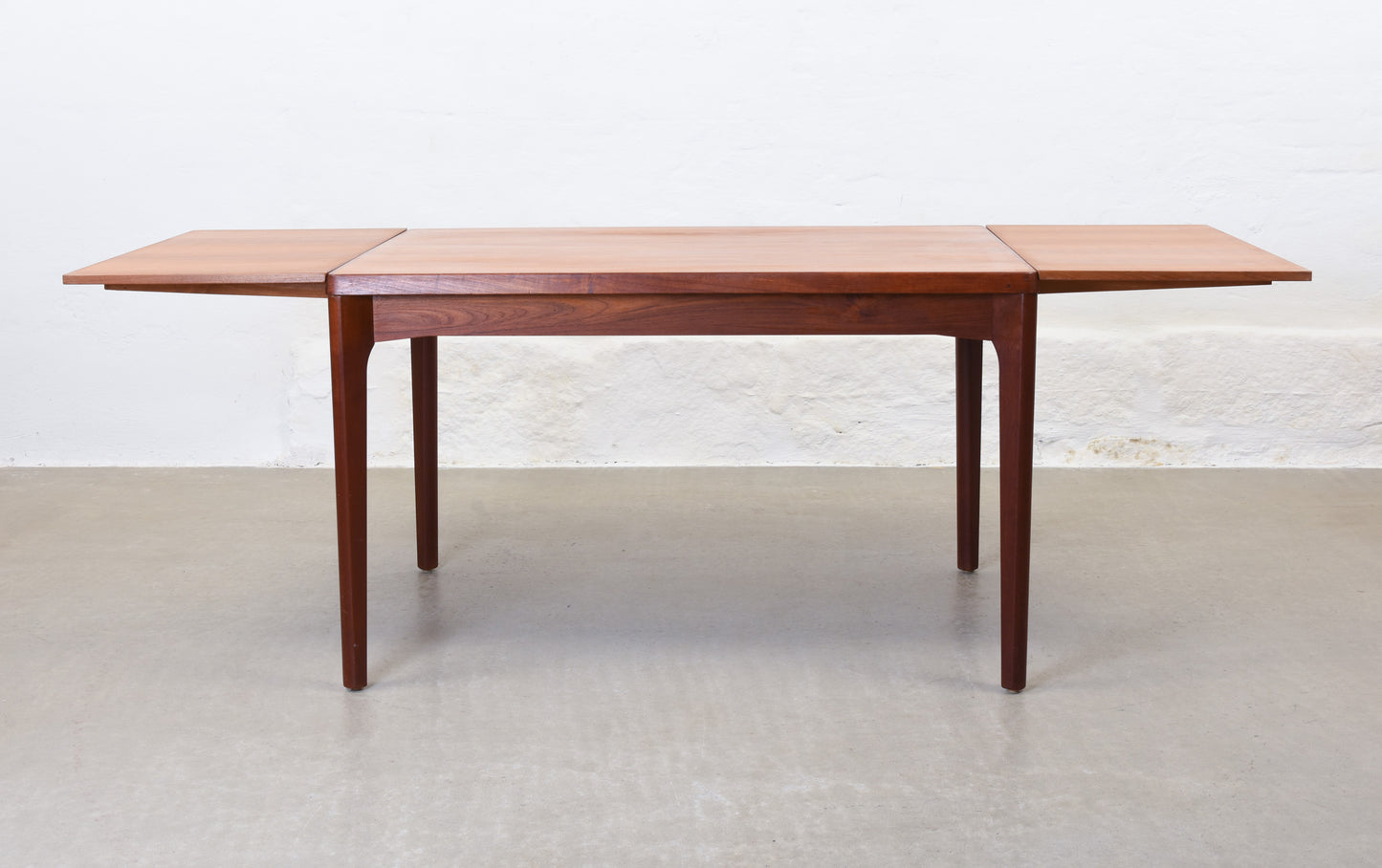 1960s extending teak dining table by Henning Kjærnulf