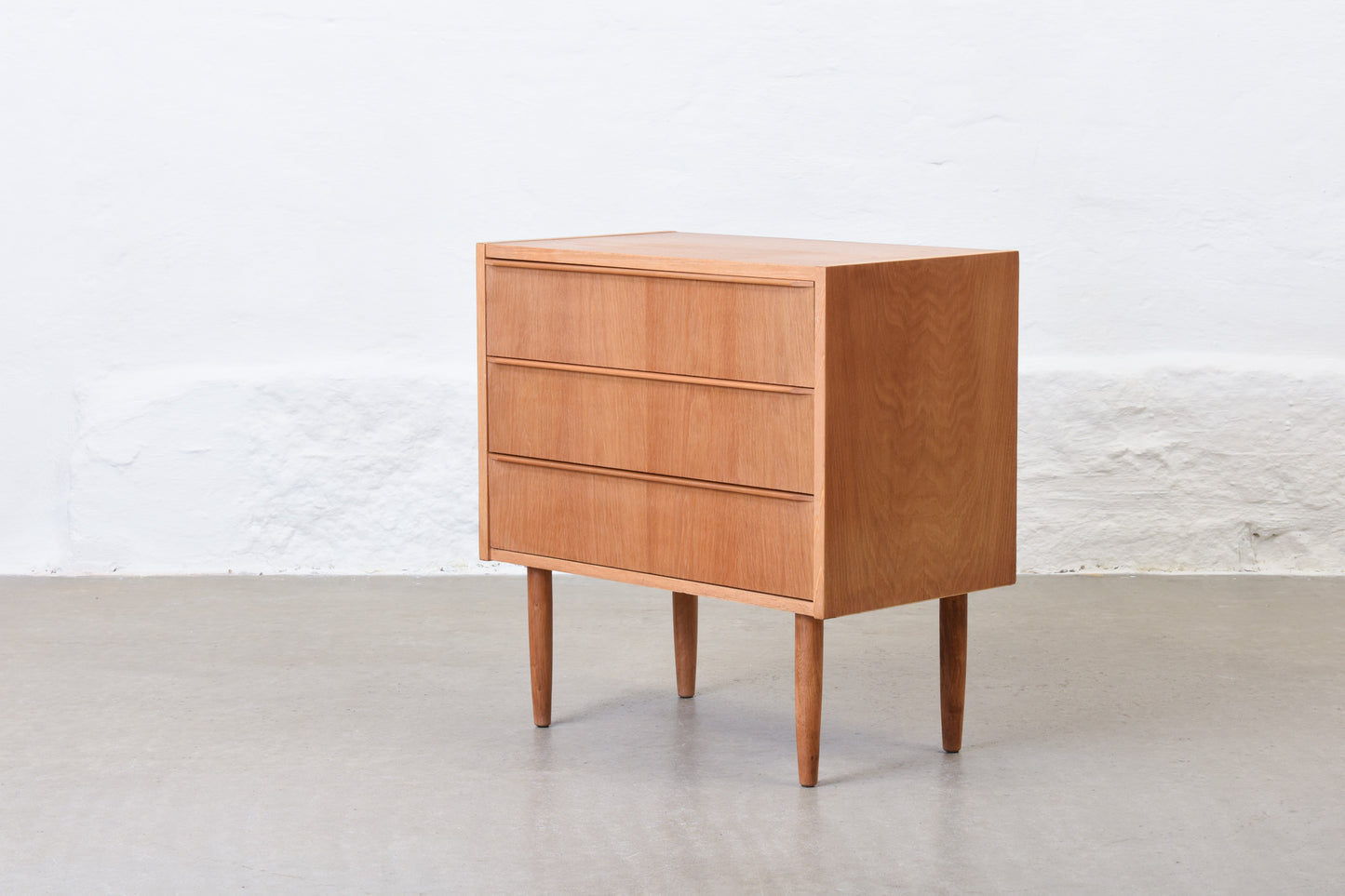 1960s oak chest of three drawers