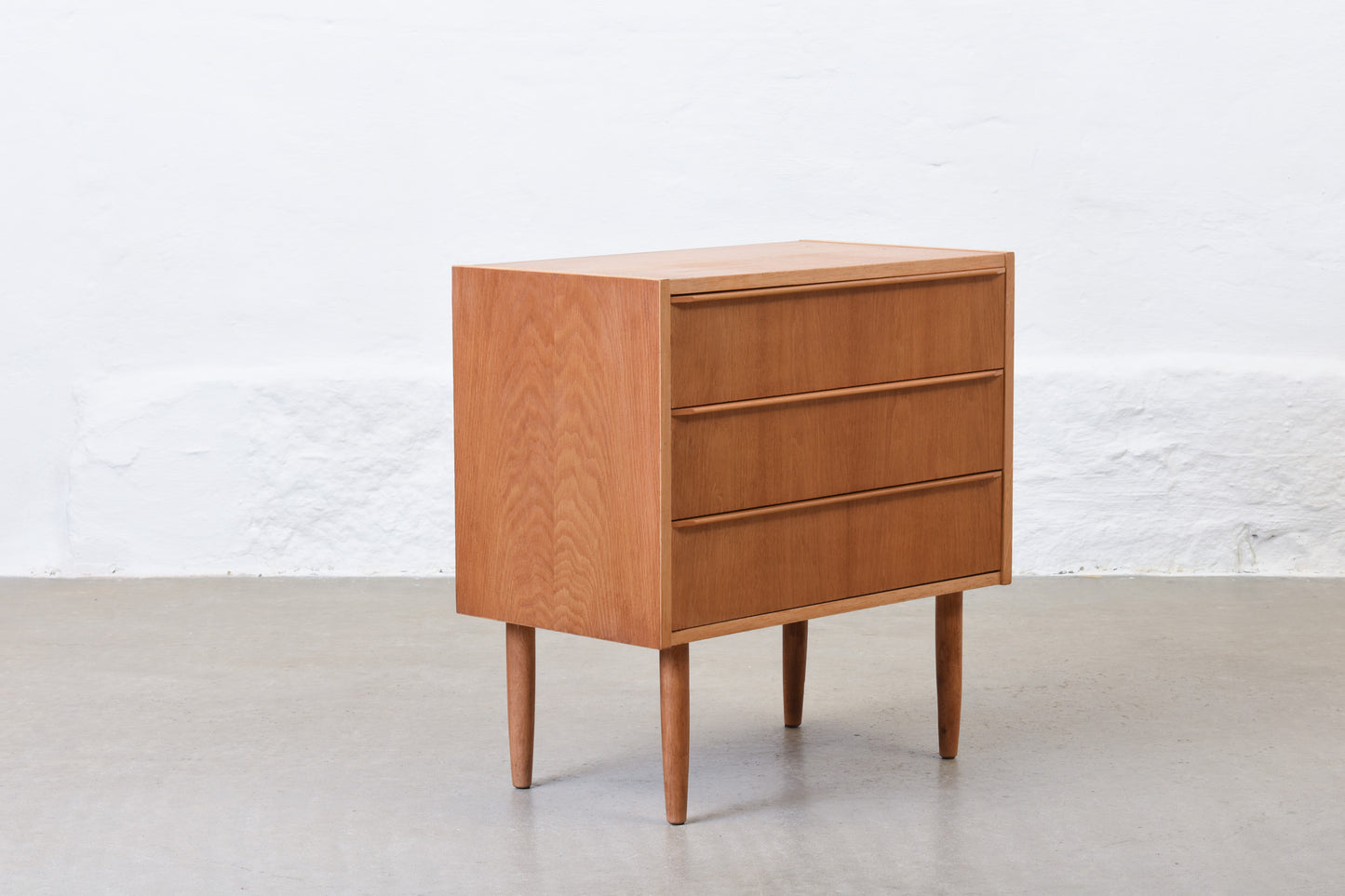 1960s oak chest of three drawers