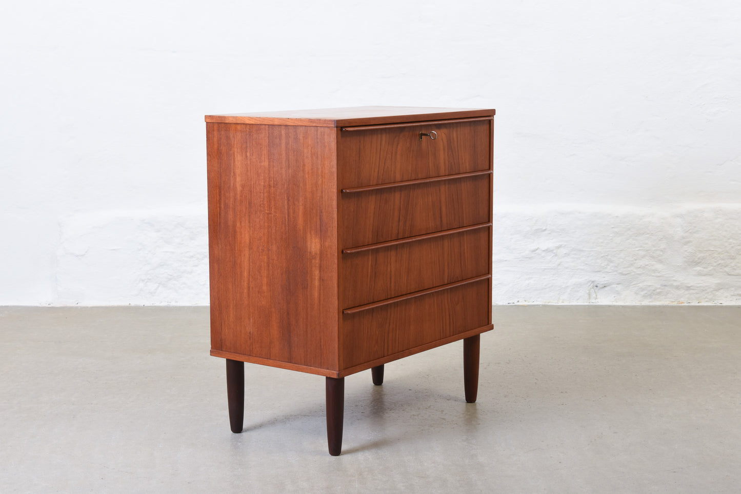1960s teak chest of four drawers