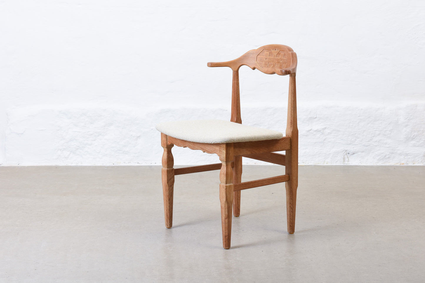Newly reupholstered: 1960s oak chair by Henning Kjærnulf
