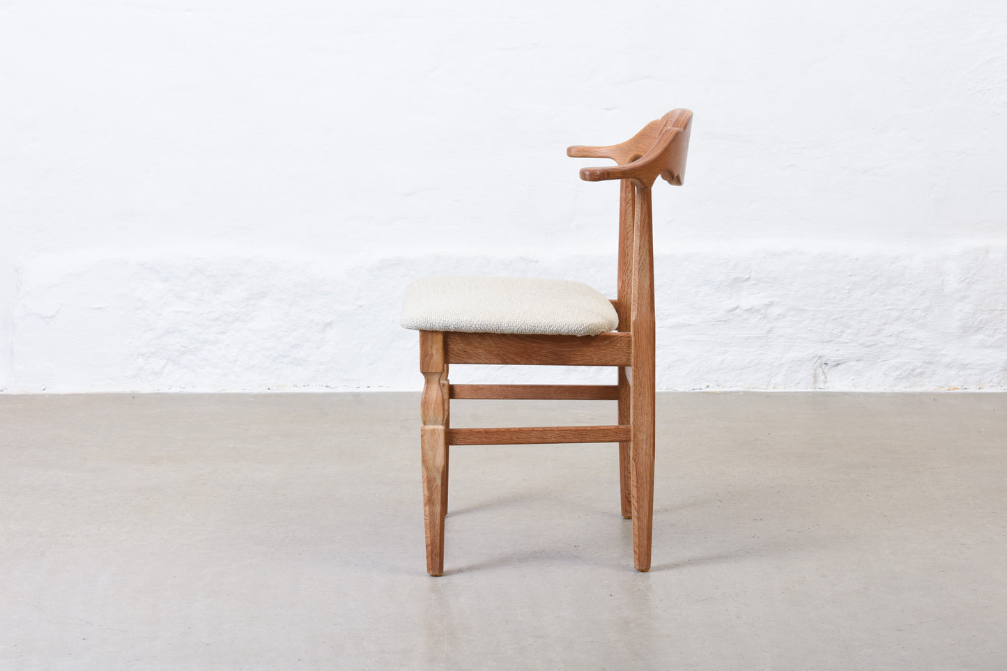 Newly reupholstered: 1960s oak chair by Henning Kjærnulf