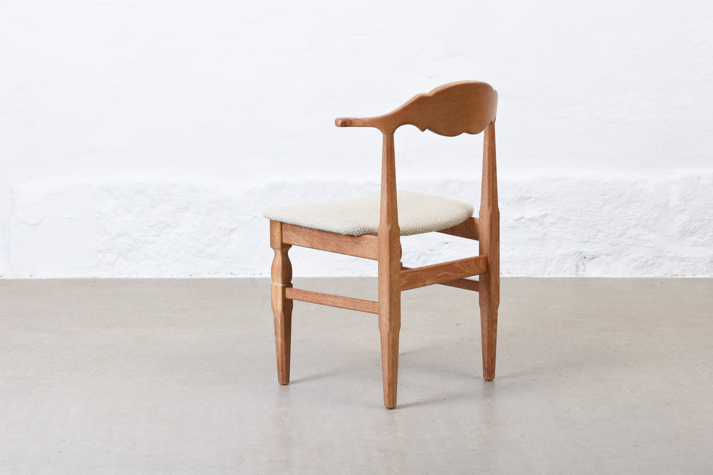 Newly reupholstered: 1960s oak chair by Henning Kjærnulf
