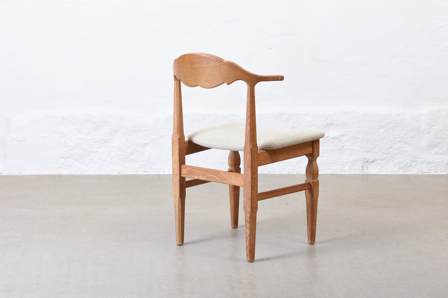 Newly reupholstered: 1960s oak chair by Henning Kjærnulf