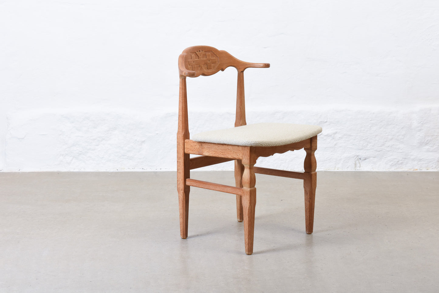 Newly reupholstered: 1960s oak chair by Henning Kjærnulf
