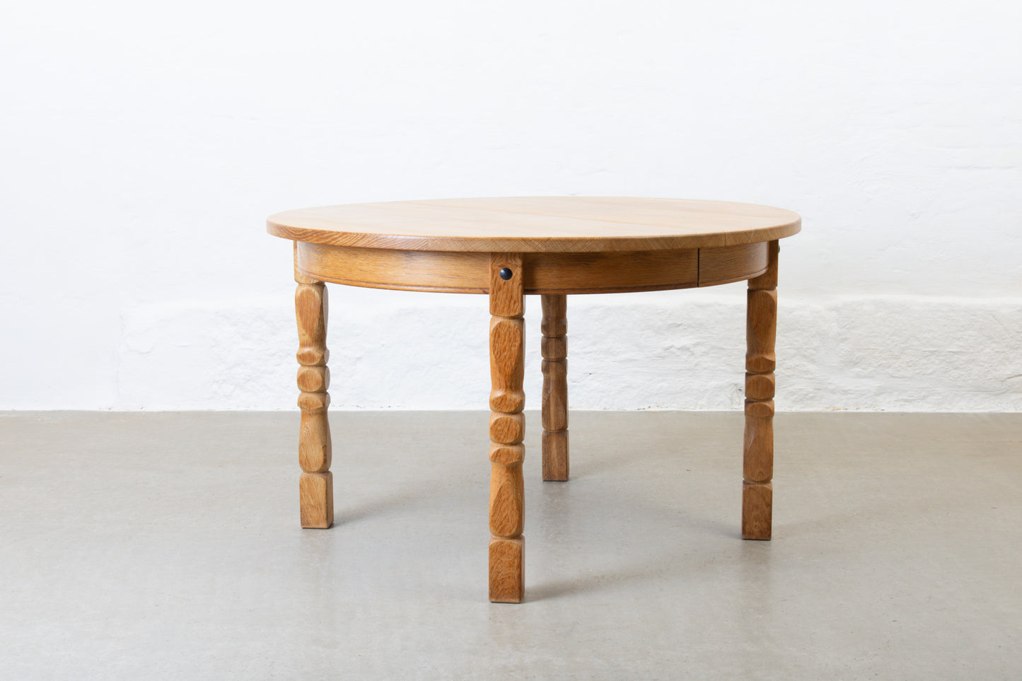 1970s extending circular dining table in oak