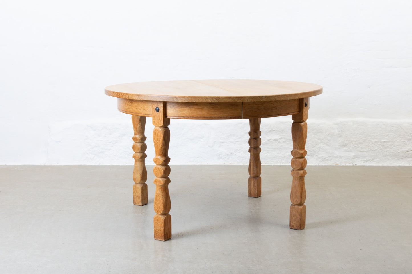 1970s extending circular dining table in oak