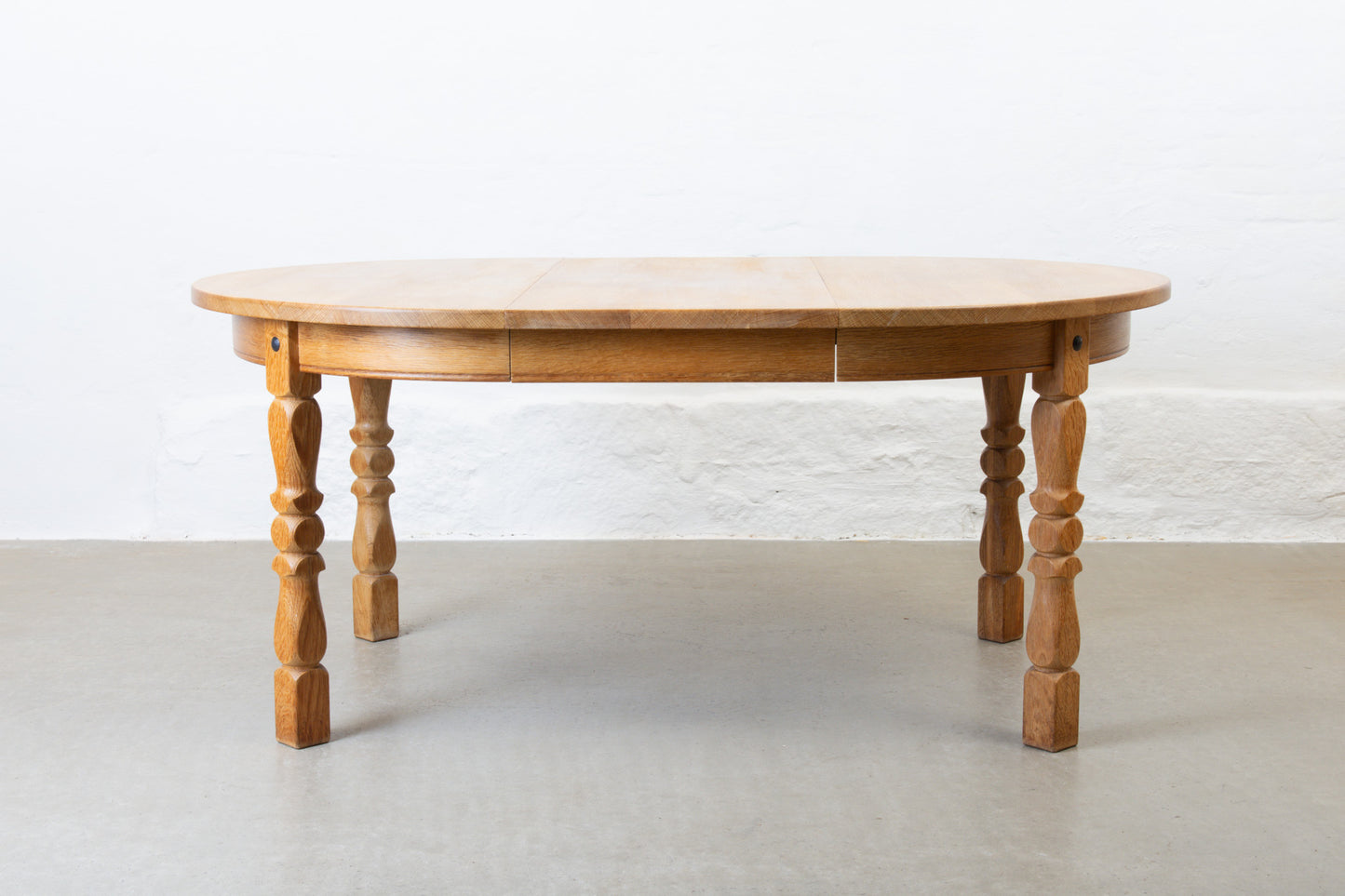 1970s extending circular dining table in oak